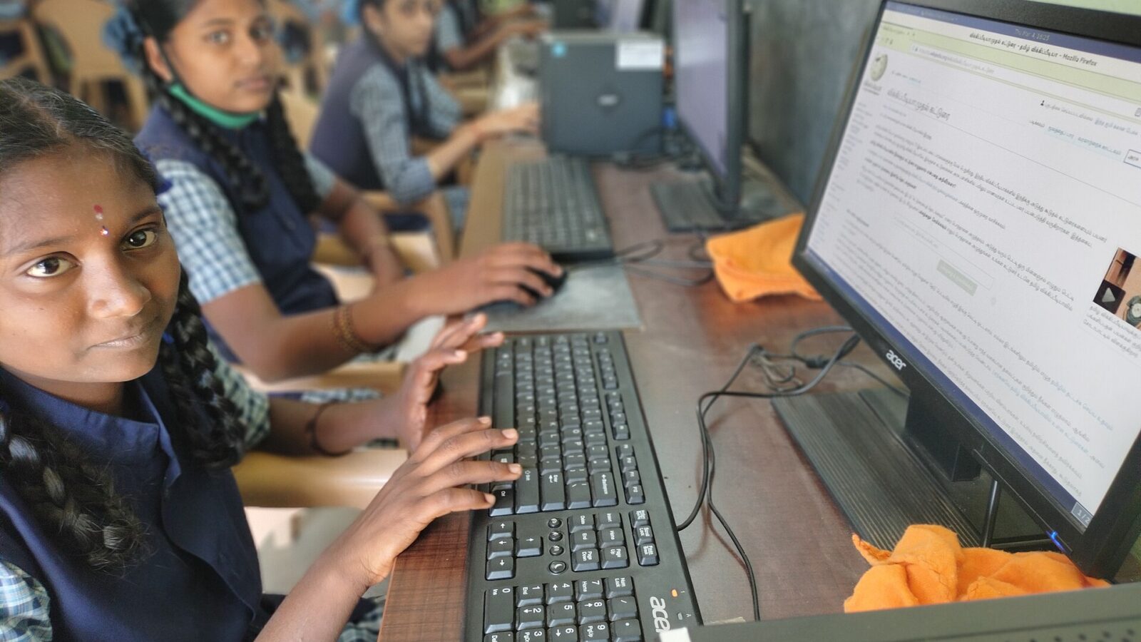 Students taking an exam on computers